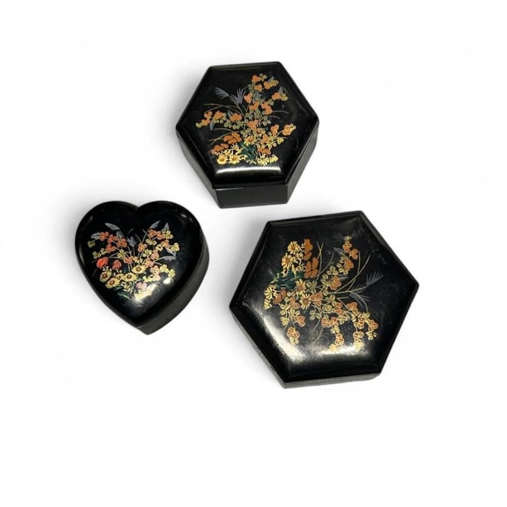 Set of three vintage black floral trinket boxes with whimsical floral pattern